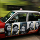 Portraits of resigned pro-democracy lawmakers (L-R) Leung Kwok-hung, Raymond Wong, Albert Chan, Alan Leong and Tanya Chan are printed on a taxi as an advertistment ahead of a by-election in Hong Kong May 5, 2010. Five Hong Kong lawmakers resigned from the legislature in late January in a bid to pressure China to grant the former British colony greater and swifter democratic concessions. The by-election on May 16 is being seen as a de facto referendum on full democracy in the territory.